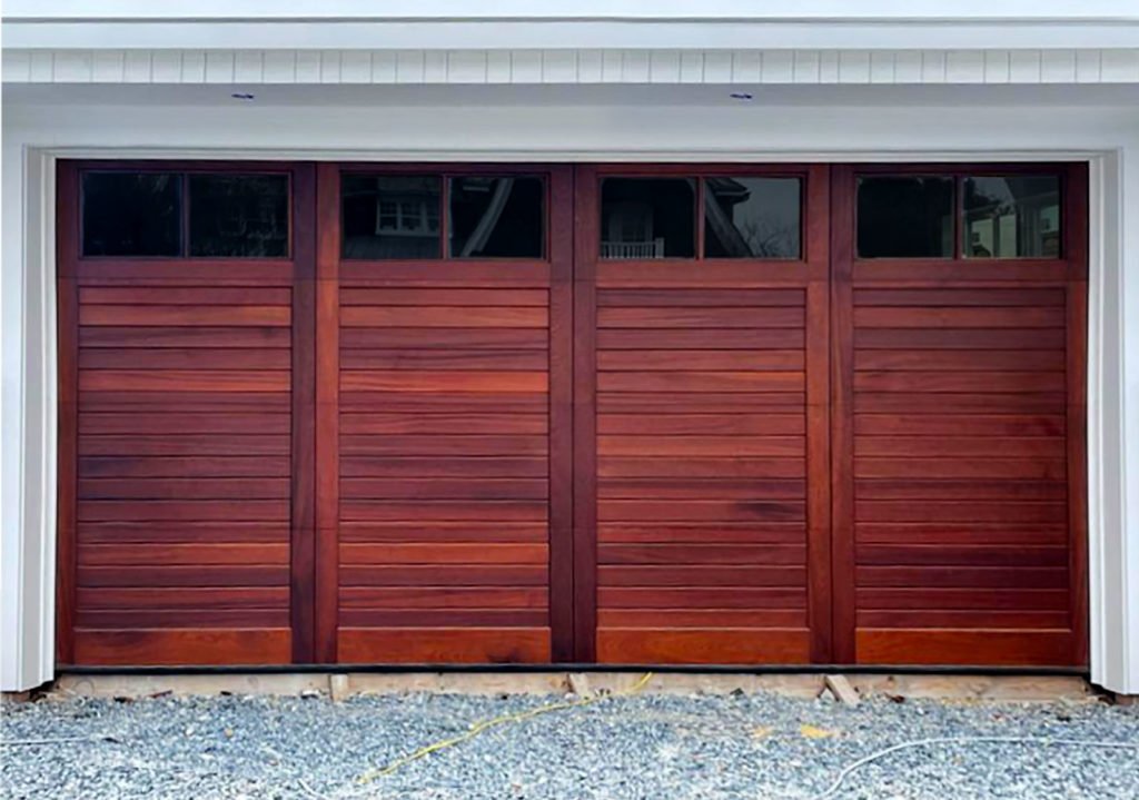 Custom garage doors installed on a modern home in Upper Arlington, showcasing professional garage door repair and personalized design options.